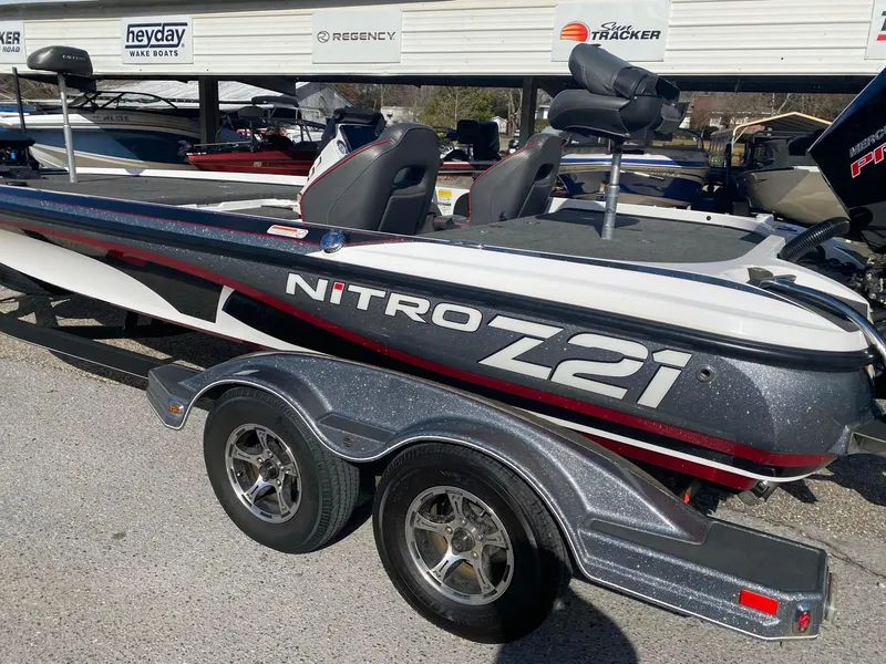 Slide: The Image of 2020 Nitro Z21 Pro boat on trailer, displayed outdoors. - 4