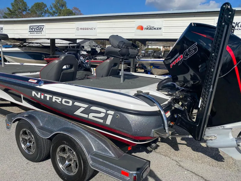 Slide: The Image of 2020 Nitro Z21 Pro boat with trailer, displayed outdoors at a dealership. - 5