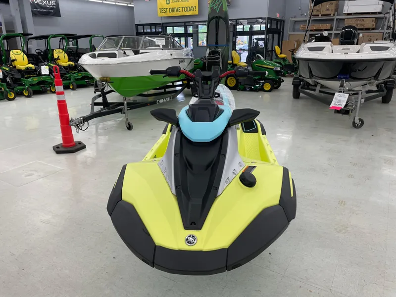 Slide: The Image of 2025 Yamaha WaveRunner JetBlaster PRO 3-Up in showroom, surrounded by boats and equipment. - 3
