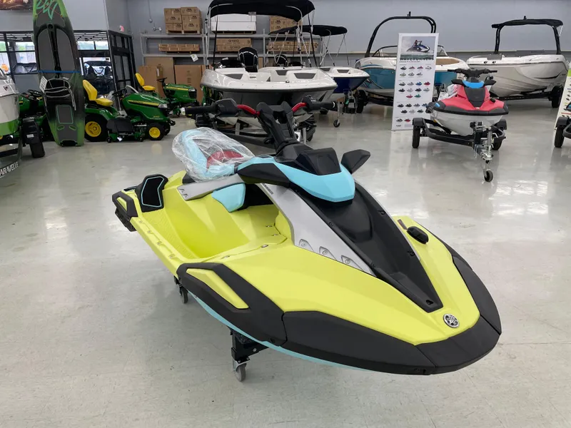 Slide: The Image of 2025 Yamaha WaveRunner JetBlaster PRO 3-Up in showroom, vibrant yellow and black design. - 4