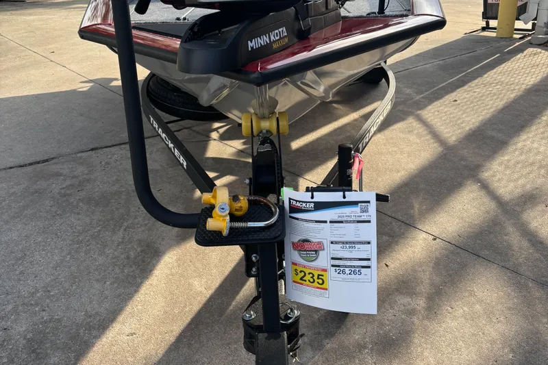 Slide: The Image of 2025 Tracker Pro Team 175 boat trailer with price tag displayed. - 3