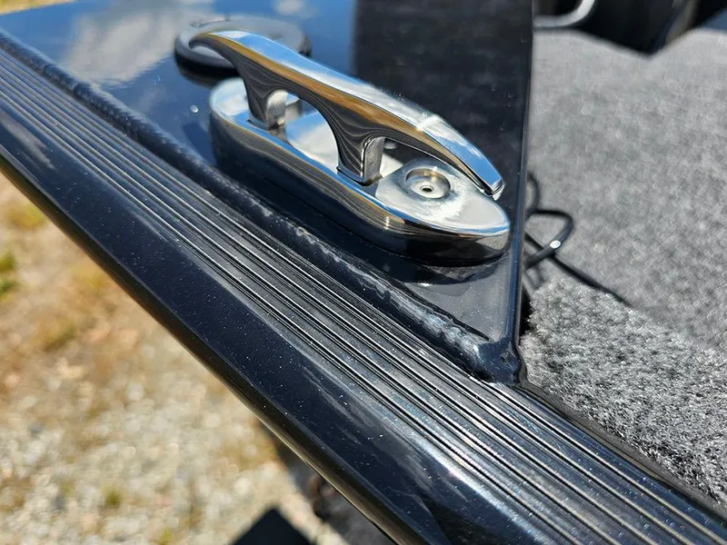 Slide: The Image of 2025 Tracker Bass Tracker Classic XL boat cleat on textured surface. - 21