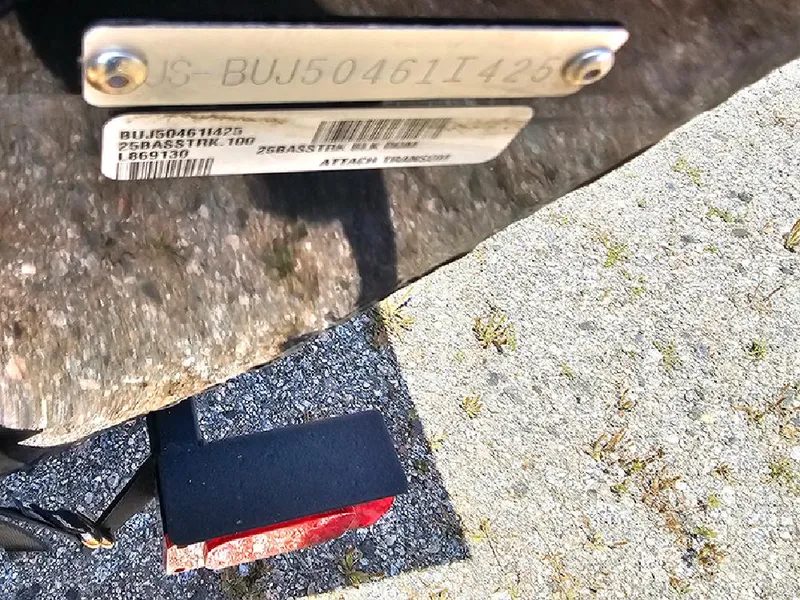 Slide: The Image of 2025 Tracker Bass Tracker Classic XL identification plate and barcode on a textured surface. - 22