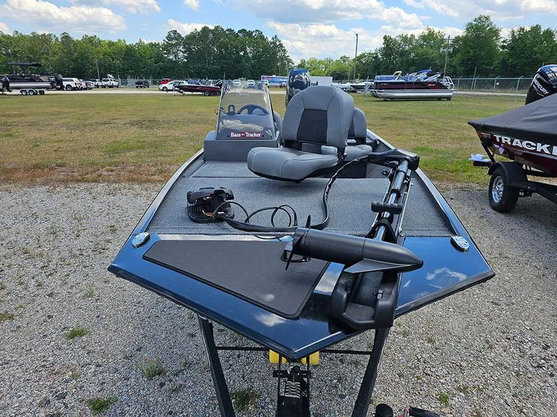 Slide: The Image of 2025 Tracker Bass Tracker Classic XL boat on display in outdoor setting. - 4