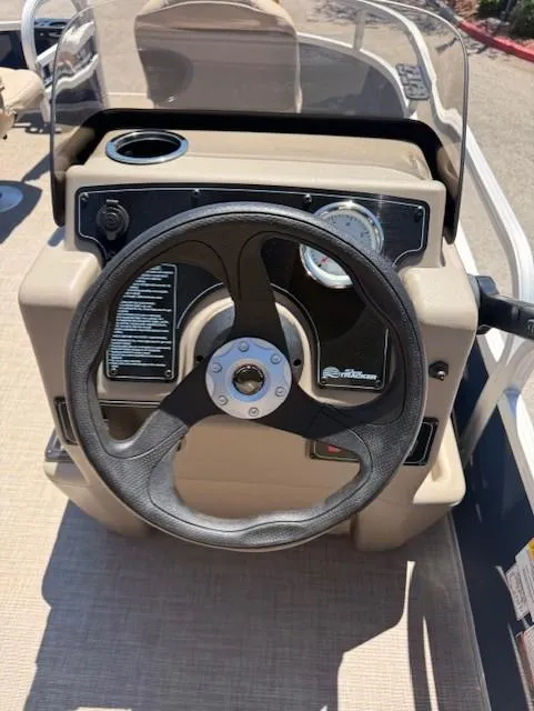Slide: The Image of Steering console of 2025 Sun Tracker Bass Buggy 16 XL Select pontoon boat. - 6