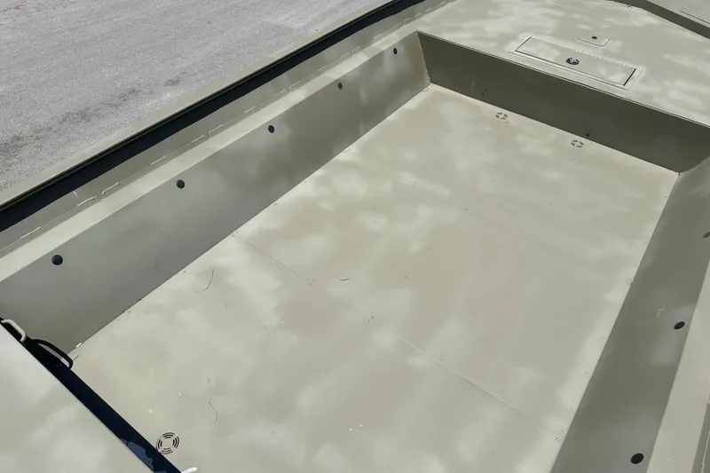 Slide: The Image of Interior view of 2025 Tracker Grizzly 2072 Utility boat, showcasing spacious deck layout. - 9