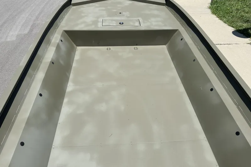 Slide: The Image of 2025 Tracker Grizzly 2072 Utility boat interior, showcasing spacious, durable design. - 6