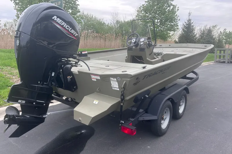 Slide: The Image of 2024 Tracker Grizzly 2072 CC boat with Mercury engine on trailer. - 8