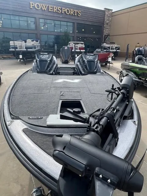 Slide: The Image of 2025 Nitro Z20 XL Pro boat displayed at Powersports dealership. - 5