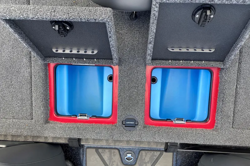 Slide: The Image of 2025 Nitro Z20 XL Pro boat storage compartments with blue interiors and secure latches. - 17