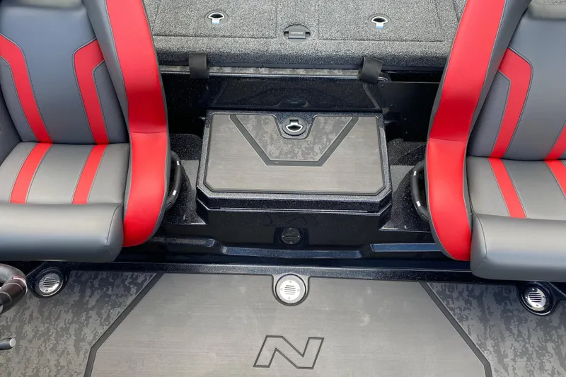 Slide: The Image of 2025 Nitro Z20 XL Pro boat interior with red and gray seats, storage compartments. - 6
