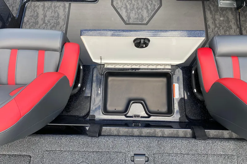 Slide: The Image of 2025 Nitro Z20 XL Pro boat interior with storage compartment and red-gray seats. - 7