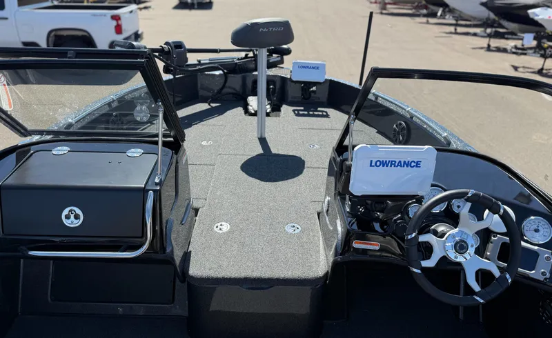 Slide: The Image of 2024 Nitro ZV19 Sport Pro boat interior with Lowrance electronics and steering wheel. - 9