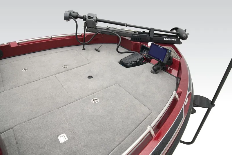 Slide: The Image of 2024 Nitro ZV19 Pro boat with powerful 225 HP outboard motor, parked outside a store. - 8