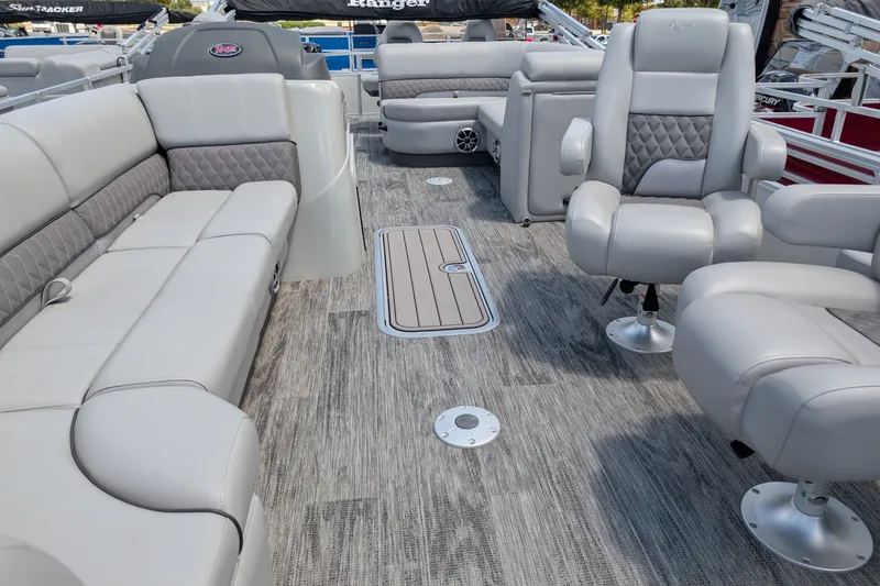 Slide: The Image of Luxurious interior of 2025 Ranger Reata 223FC boat with plush seating and modern design. - 6