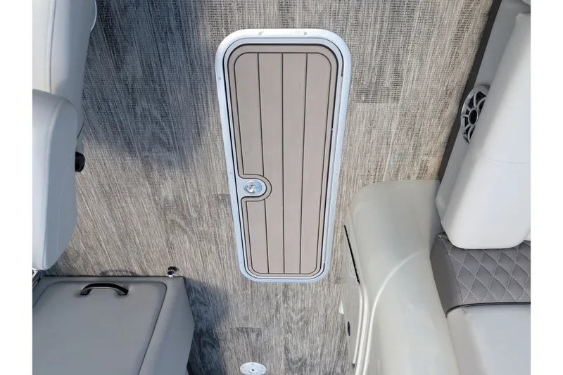 Slide: The Image of 2025 Ranger Reata 223FC boat interior with sleek flooring and seating. - 7