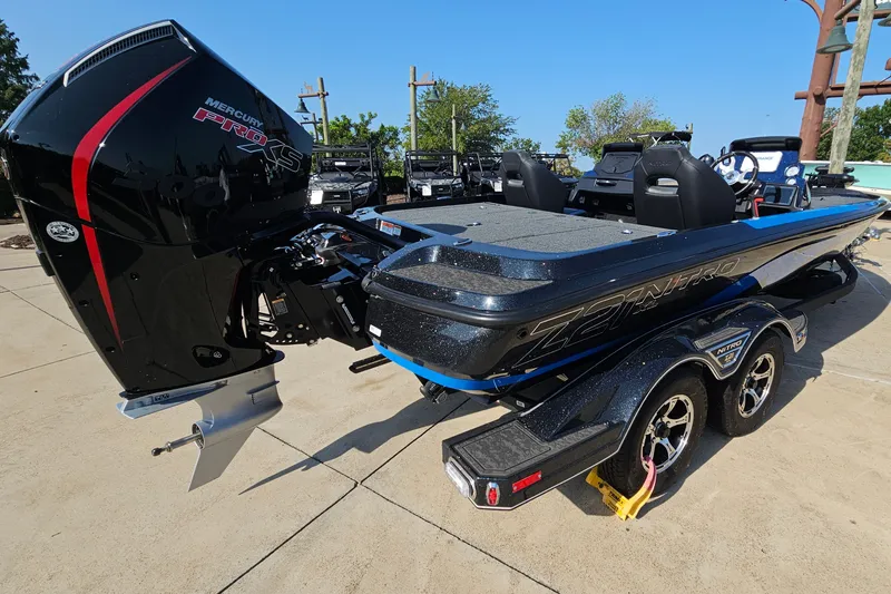Slide: The Image of 2025 Nitro Z21 XL boat with Mercury Pro XS engine on a trailer. - 5
