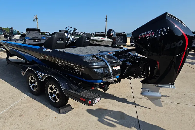 Slide: The Image of 2025 Nitro Z21 XL boat with Mercury Pro XS 300 engine on a trailer. - 7