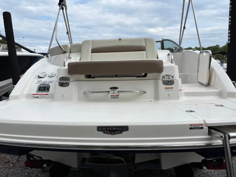 Slide: The Image of 2014 Chaparral 224 Sunesta boat, rear view with swim platform and seating. - 18