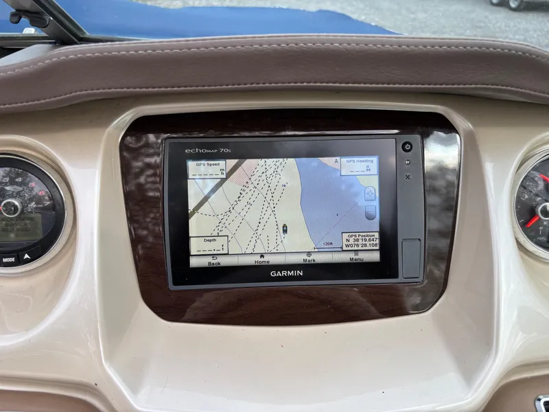 Slide: The Image of Dashboard of 2014 Chaparral 224 Sunesta with Garmin GPS navigation system. - 27