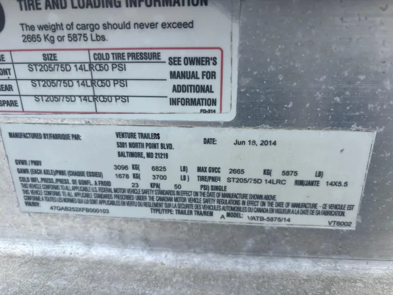 Slide: The Image of 2014 Chaparral 224 Sunesta trailer label with tire and loading information, manufactured by Venture Trailers. - 46