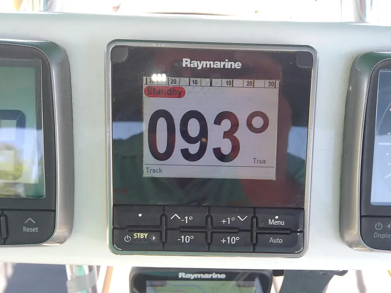 Slide: The Image of Raymarine navigation display showing 093 degrees on a Com-Pac 27/3, 2017 model. - 23