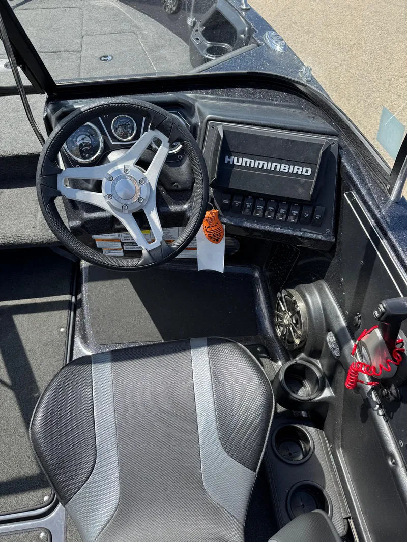 Slide: The Image of 2022 Skeeter Solera 205 boat interior with steering wheel and Hummingbird electronics. - 15