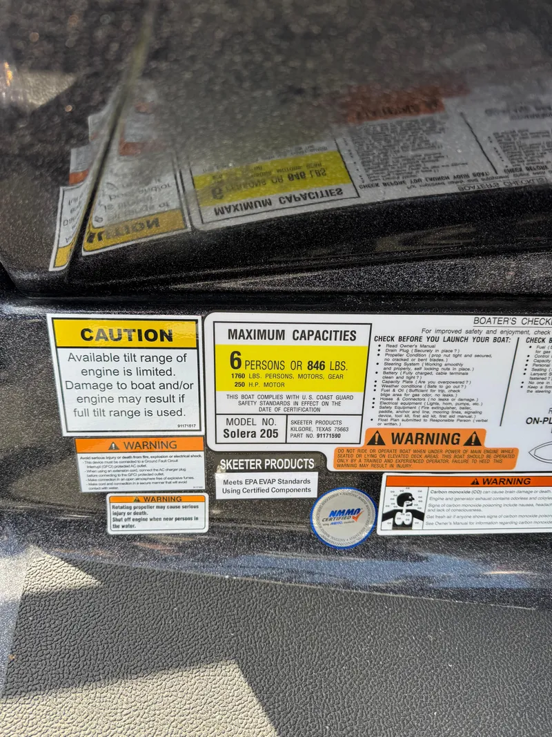 Slide: The Image of 2022 Skeeter Solera 205 capacity label, caution warnings, and safety instructions. - 16