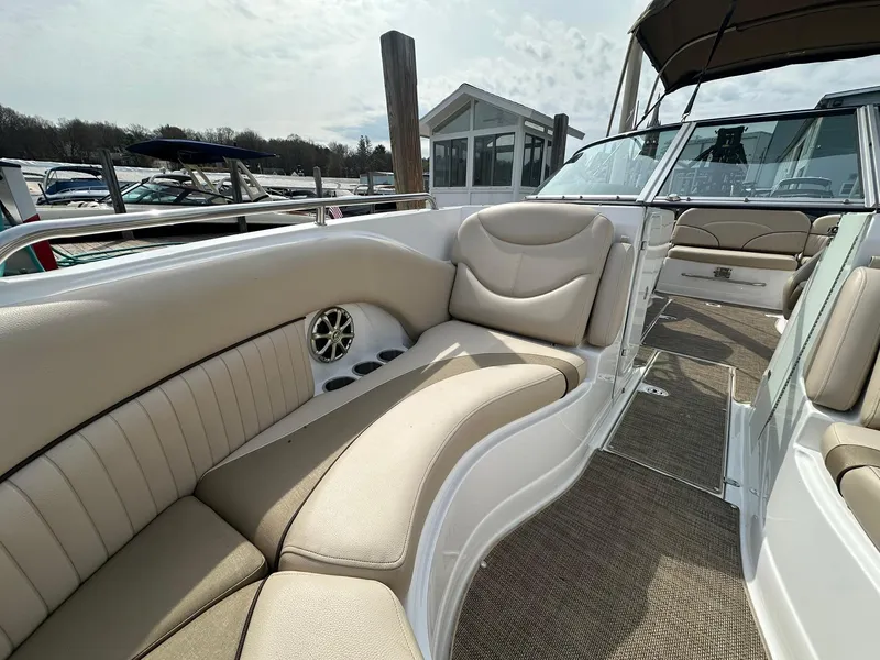 Slide: The Image of 2014 Cruisers Sport Series 278 Bow Rider with beige seating and spacious deck. - 17
