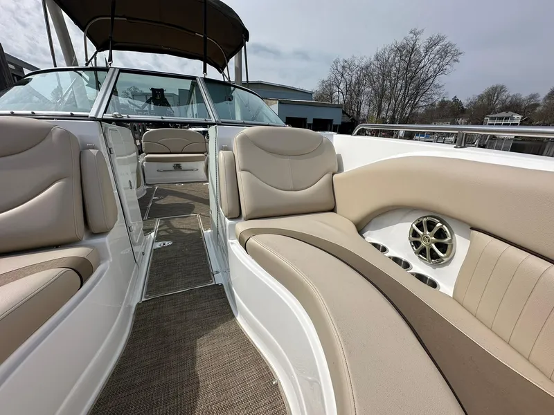 Slide: The Image of 2014 Cruisers Sport Series 278 Bow Rider with beige seating and open deck view. - 18