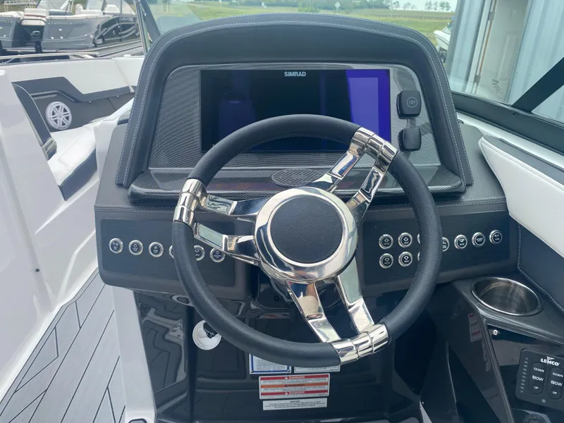 Slide: The Image of 2025 Monterey 278 Super Sport dashboard with steering wheel and digital display. - 21