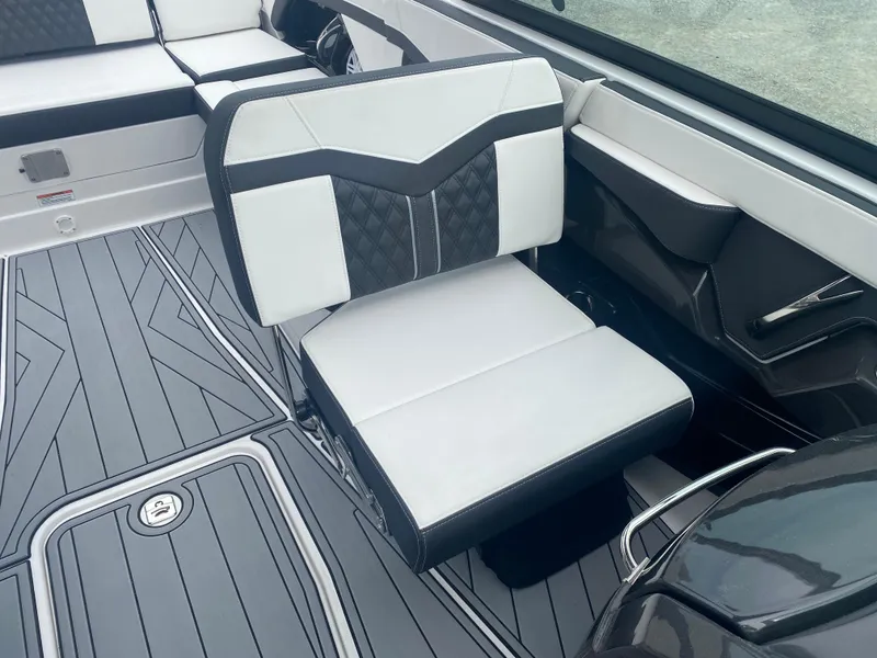 Slide: The Image of 2025 Monterey 278 Super Sport boat interior with stylish seating and modern design. - 24