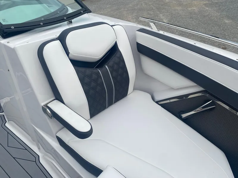 Slide: The Image of 2025 Monterey 278 Super Sport boat seat with black and white upholstery, modern design. - 27