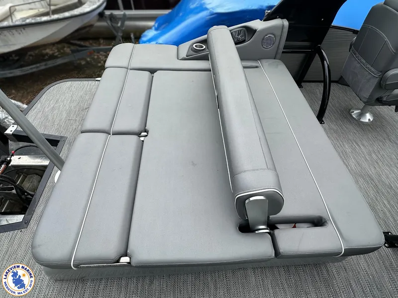 Slide: The Image of 2020 Bennington R 25 RSBA boat with gray cushioned seating and adjustable backrest. - 13