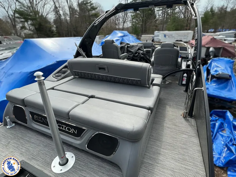 Slide: The Image of 2020 Bennington R 25 RSBA pontoon boat with gray seating and sleek design. - 14