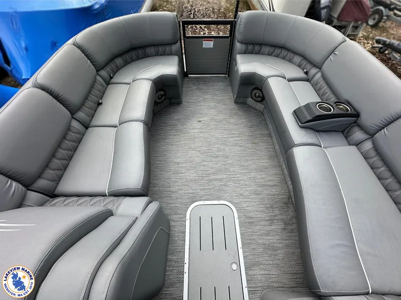 Slide: The Image of 2020 Bennington R 25 RSBA pontoon boat with spacious gray seating and cup holders. - 4