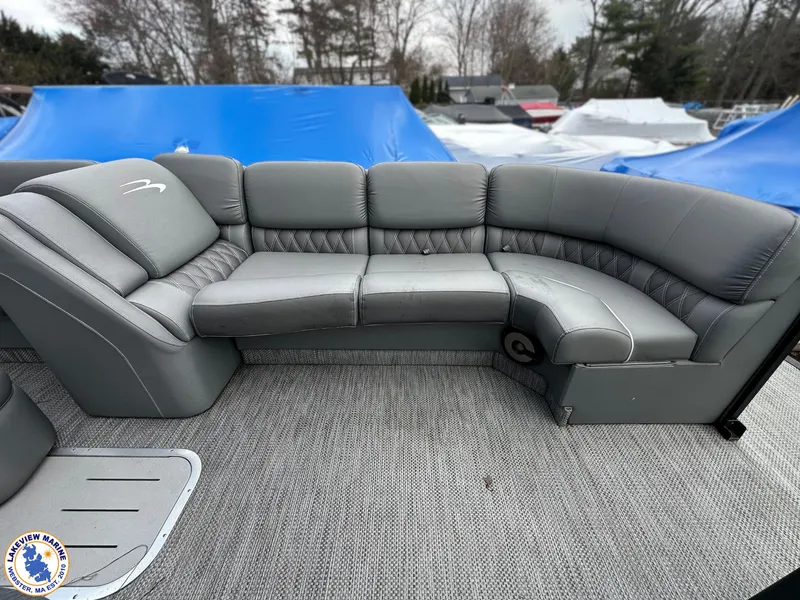 Slide: The Image of 2020 Bennington R 25 RSBA pontoon boat with luxurious gray seating and spacious deck. - 5