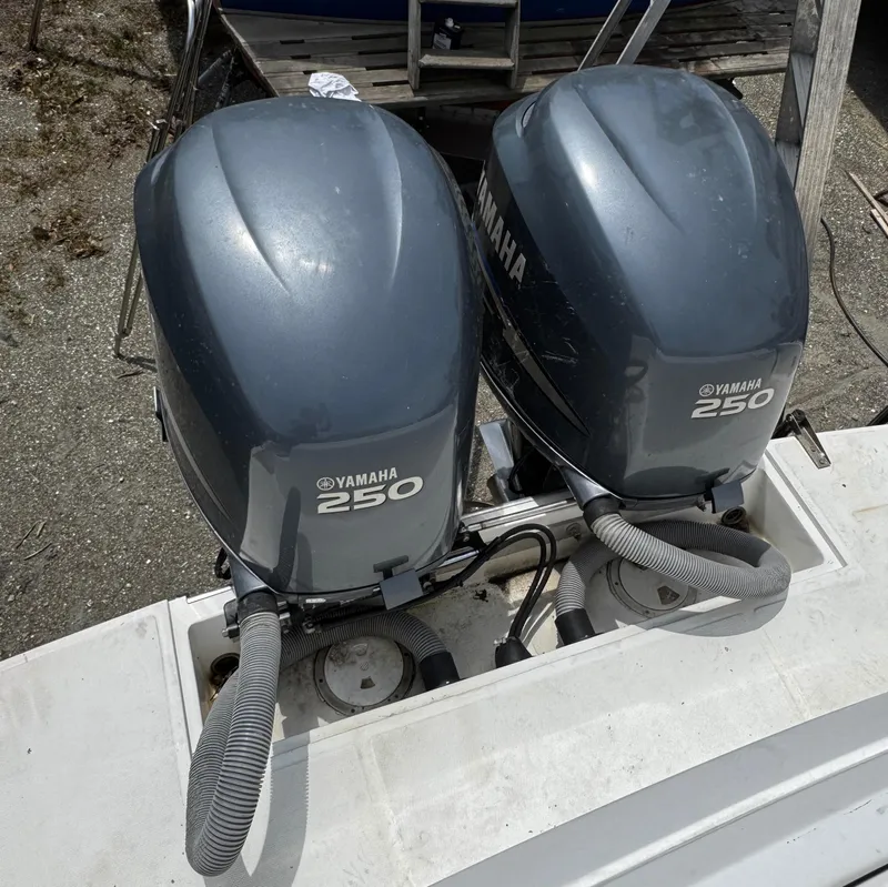 Slide: The Image of Twin Yamaha 250 outboard engines on a 2001 Stamas 310 Express boat. - 12