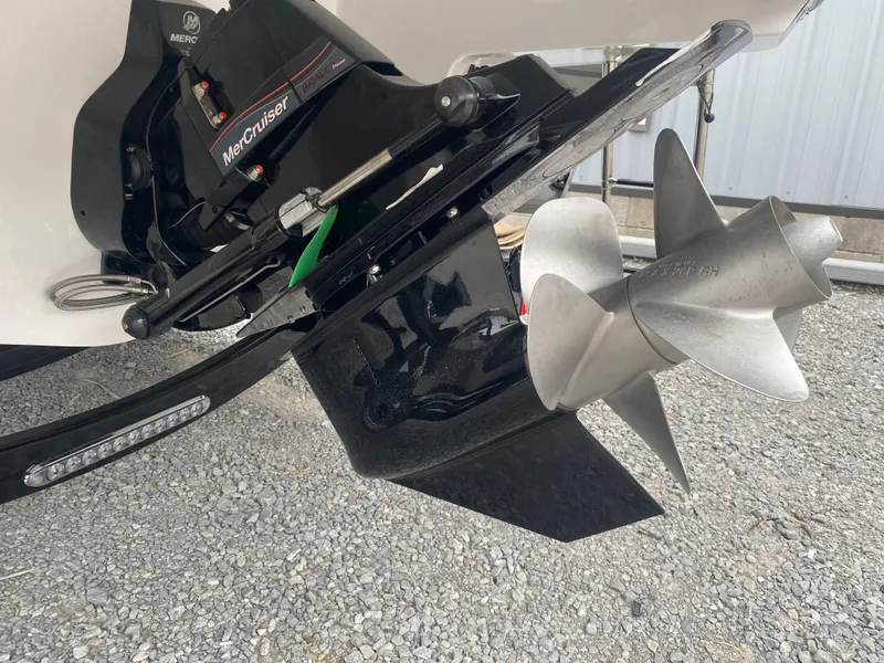 Slide: The Image of 2025 Monterey 258 Super Sport boat propeller and MerCruiser engine detail. - 10