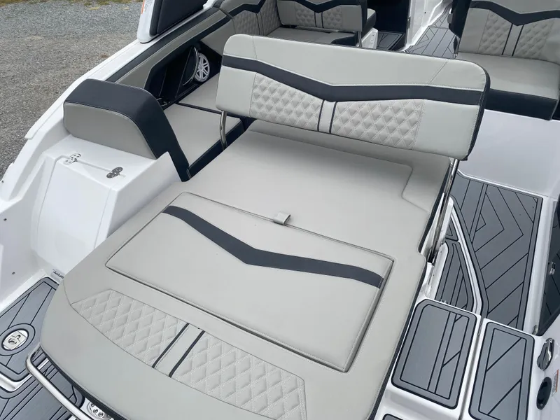 Slide: The Image of 2025 Monterey 258 Super Sport boat interior with sleek, modern seating and stylish design. - 13