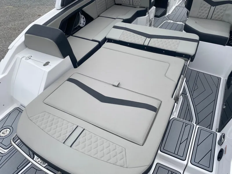 Slide: The Image of 2025 Monterey 258 Super Sport boat interior with luxurious seating and modern design. - 14