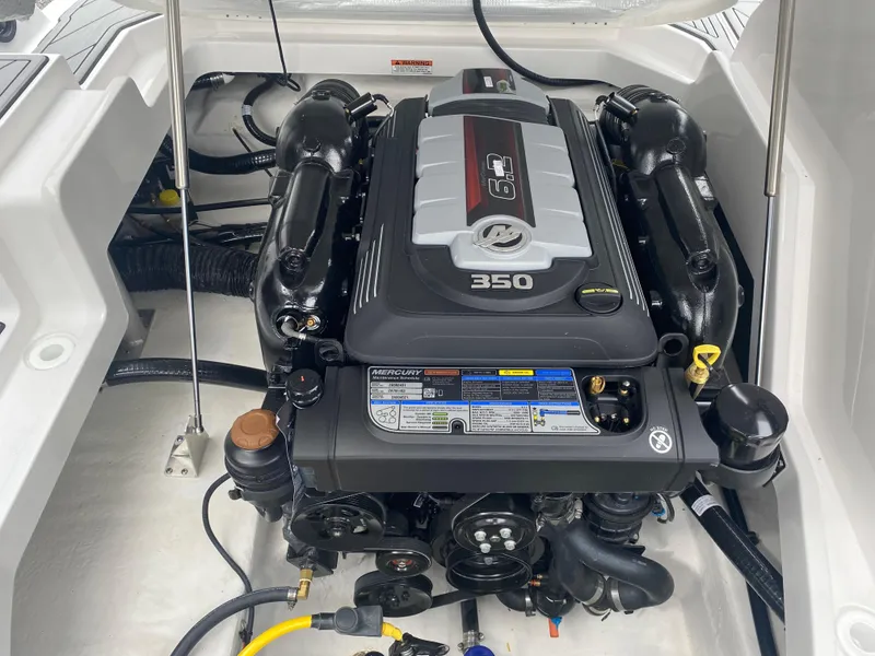 Slide: The Image of Engine compartment of 2025 Monterey 258 Super Sport boat, featuring a powerful 350 engine. - 15