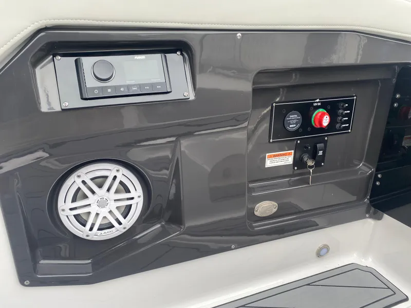 Slide: The Image of 2025 Monterey 258 Super Sport boat dashboard with speaker and control panel. - 17
