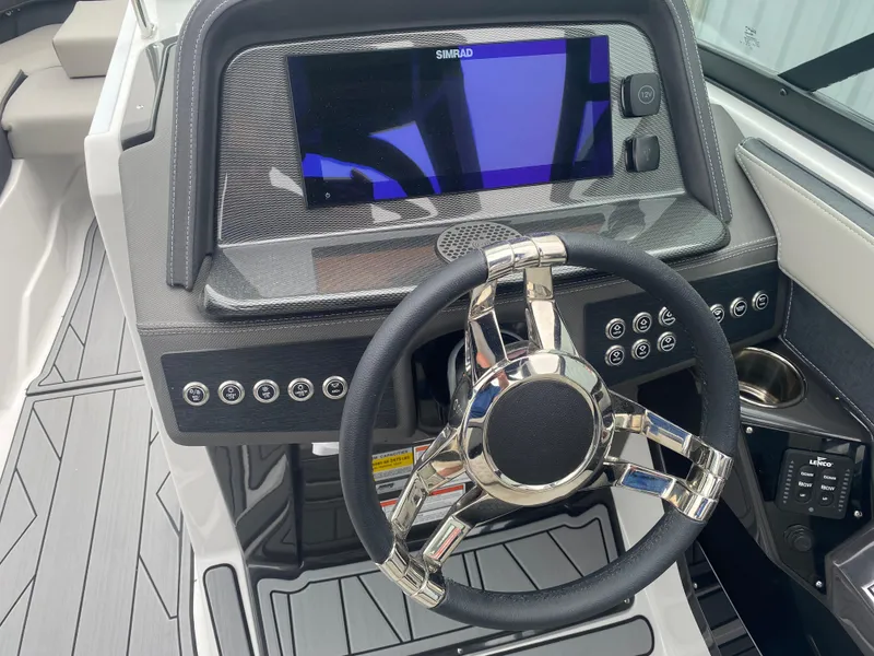 Slide: The Image of 2025 Monterey 258 Super Sport dashboard with steering wheel and digital display. - 20