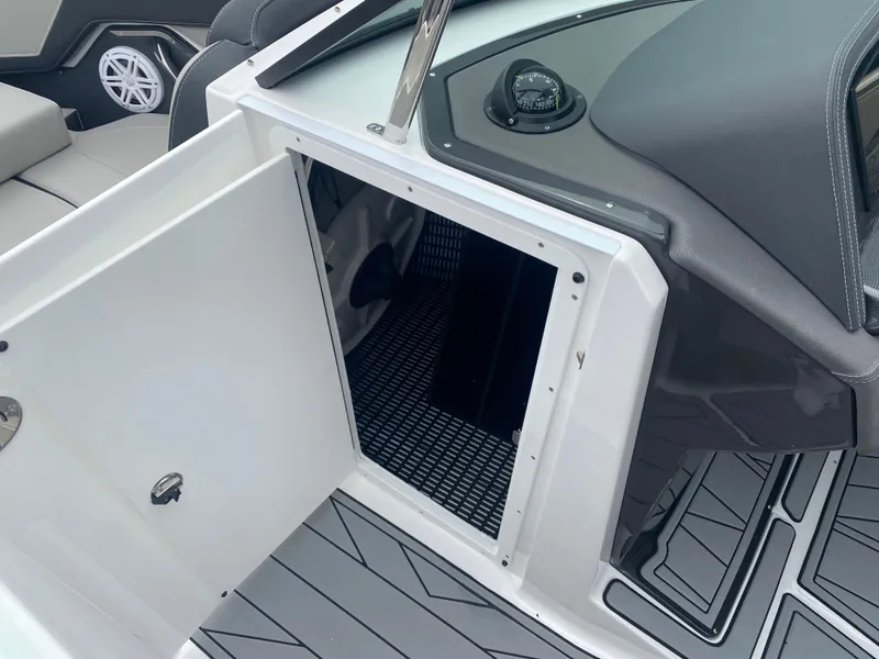 Slide: The Image of 2025 Monterey 258 Super Sport boat interior storage compartment with sleek design and modern features. - 21