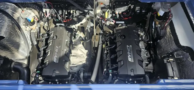 Slide: The Image of Twin engines of a 2023 Yamaha Boats 255XD, showcasing advanced marine engineering. - 5