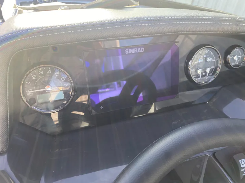 Slide: The Image of Dashboard of 2025 Monterey M6 boat with Simrad display and gauges. - 17