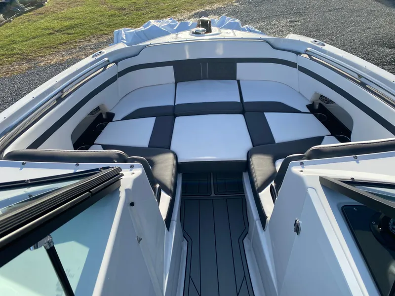 Slide: The Image of 2025 Monterey M6 boat interior with spacious seating and modern design. - 25