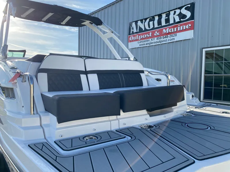 Slide: The Image of 2025 Monterey M6 boat with sleek seating at Anglers Outpost & Marine dealership. - 7