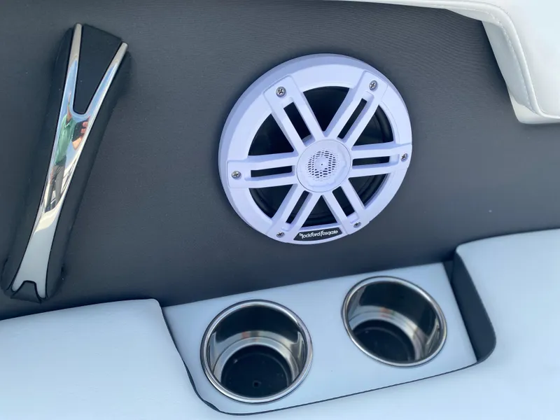 Slide: The Image of Speaker and cup holders on 2025 Monterey M-22 boat interior. - 15